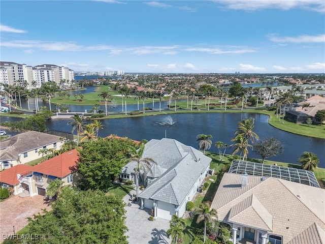 aerial view with a residential view and a water view