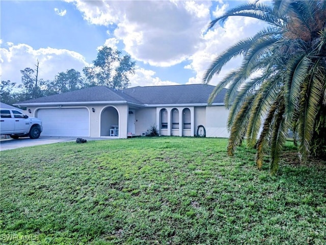 ranch-style house with a garage and a front yard