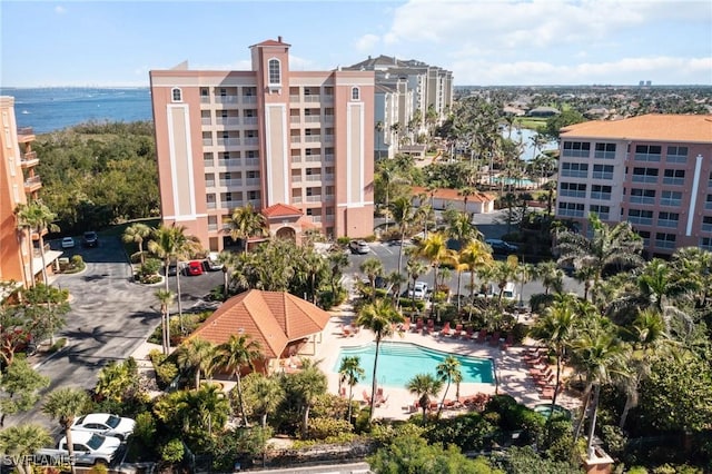 birds eye view of property with a water view