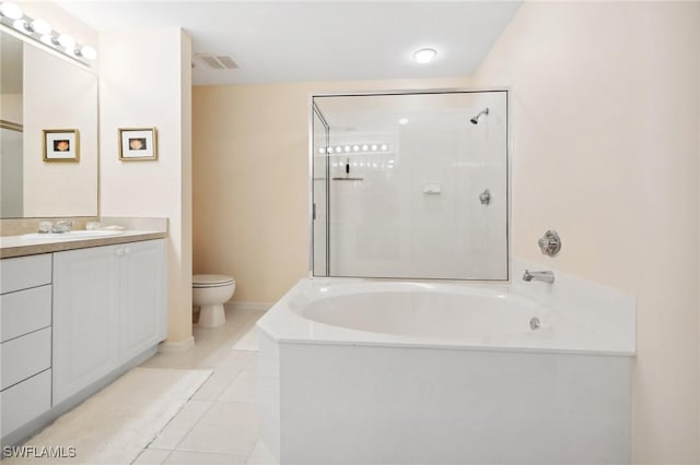 full bathroom with independent shower and bath, vanity, tile patterned floors, and toilet