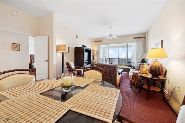 dining room featuring ceiling fan