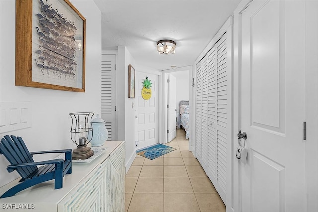 foyer entrance featuring light tile patterned floors