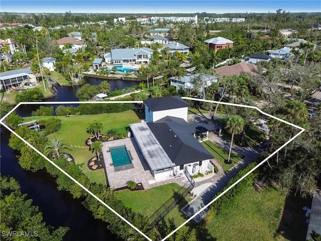 aerial view with a water view and a residential view