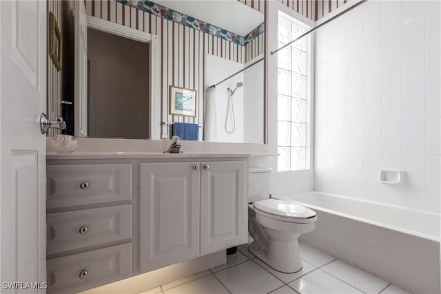 bathroom with wallpapered walls, vanity, tile patterned flooring, and toilet