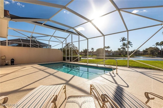 view of swimming pool with a water view, a yard, a lanai, and a patio area