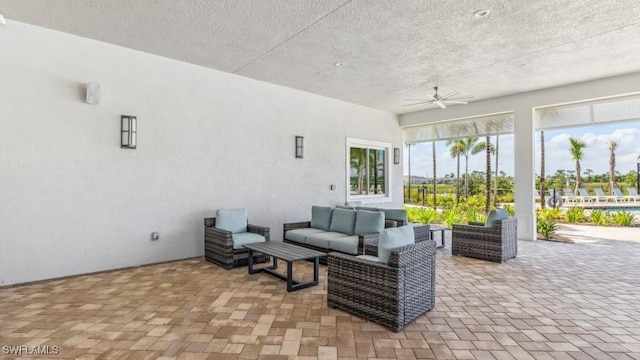 16768 Elkhorn Coral Dr, North Fort Myers, FL 33903 - view of patio / terrace featuring ceiling fan and an outdoor living space