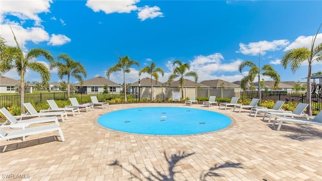 16768 Elkhorn Coral Dr, North Fort Myers, FL 33903 - community pool featuring a residential view and a patio area