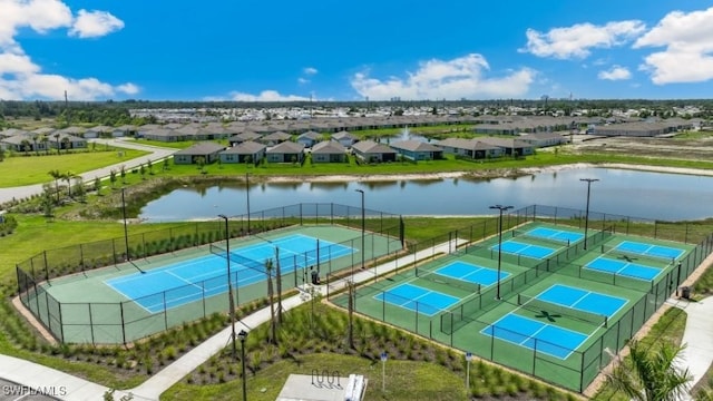 16768 Elkhorn Coral Dr, North Fort Myers, FL 33903 - aerial perspective of suburban area with a large body of water