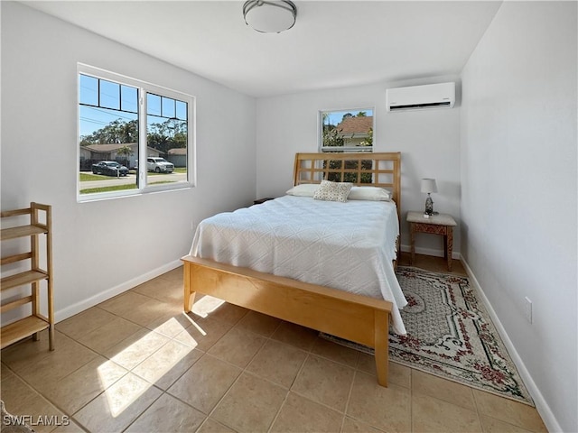 tiled bedroom featuring a wall mounted AC