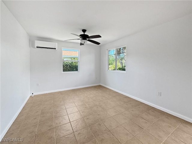 unfurnished room featuring ceiling fan and a wall unit AC