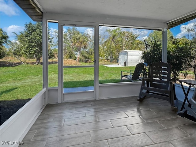 sunroom / solarium featuring a healthy amount of sunlight