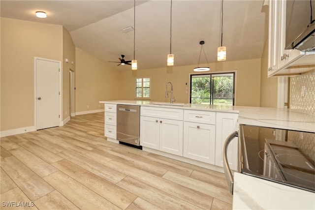 kitchen featuring sink, white cabinetry, hanging light fixtures, range with electric cooktop, and stainless steel dishwasher