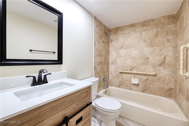 full bathroom with vanity, toilet, and tiled shower / bath