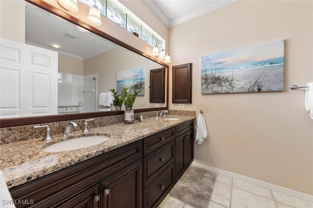 full bath with double vanity, an enclosed shower, a sink, and crown molding