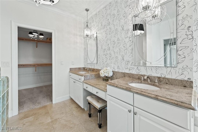 full bathroom featuring wallpapered walls, ornamental molding, and a sink