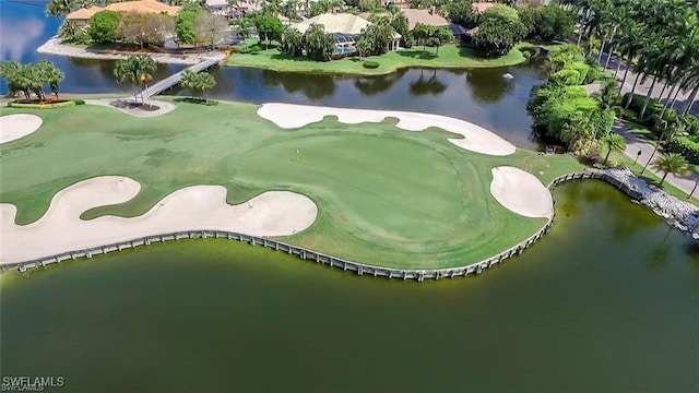 bird's eye view featuring view of golf course and a water view