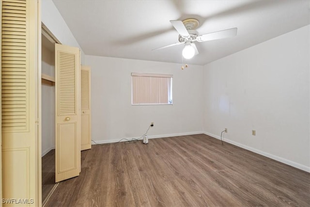 unfurnished bedroom with wood-type flooring, a closet, and ceiling fan