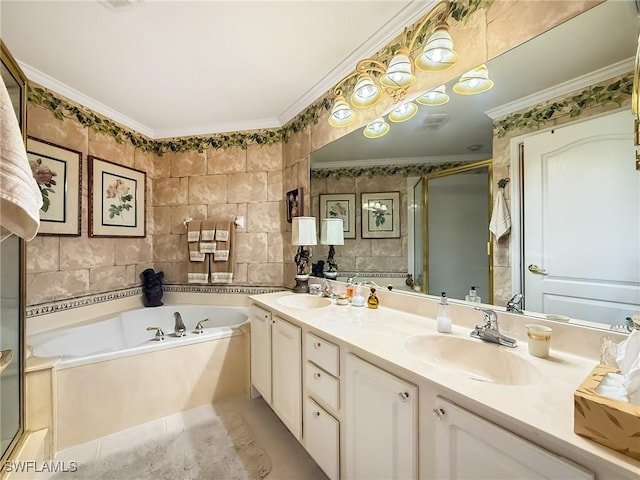 bathroom with tile walls, vanity, ornamental molding, and shower with separate bathtub