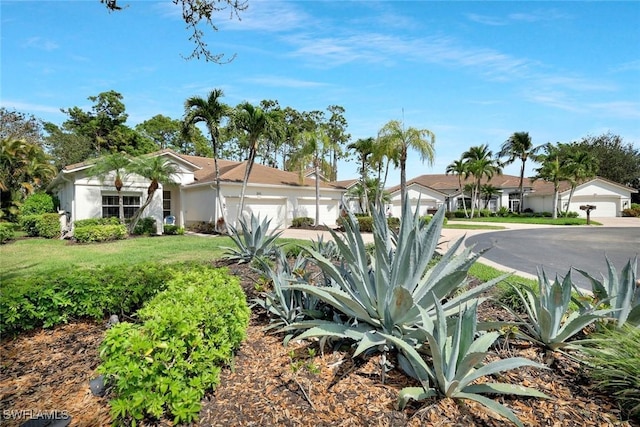 1118 Dorchester Ct, Naples, FL 34104 - view of front of house featuring a garage