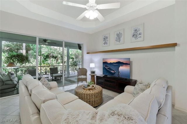 1118 Dorchester Ct, Naples, FL 34104 - tiled living room with a raised ceiling and a ceiling fan