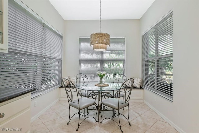 1118 Dorchester Ct, Naples, FL 34104 - dining area with light tile patterned flooring