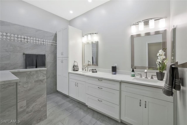 1118 Dorchester Ct, Naples, FL 34104 - full bath featuring double vanity, marble finish floor, recessed lighting, a walk in shower, and a sink