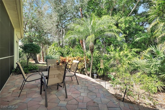 1118 Dorchester Ct, Naples, FL 34104 - view of patio / terrace with outdoor dining space