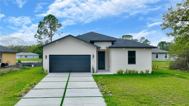 ranch-style home with stucco siding, an attached garage, driveway, and a front lawn