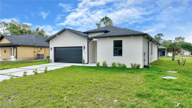 view of front of home featuring stucco siding, a front lawn, concrete driveway, an attached garage, and central AC unit