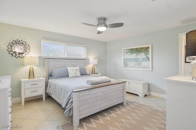 bedroom featuring light tile patterned flooring and ceiling fan