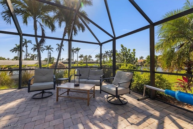 view of patio / terrace with glass enclosure