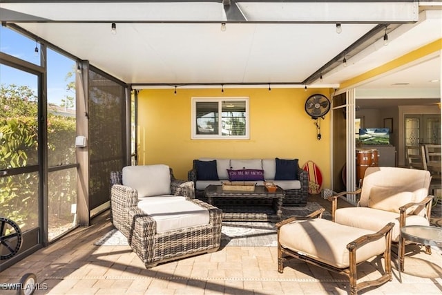 sunroom featuring a healthy amount of sunlight