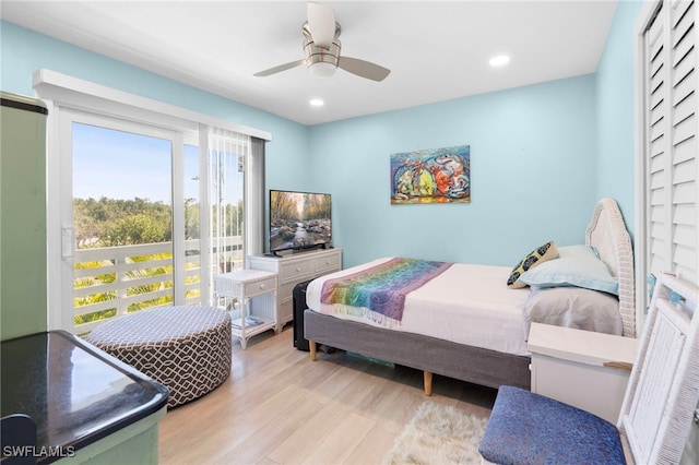 bedroom featuring ceiling fan, light wood-type flooring, and recessed lighting