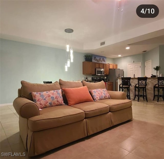 living room featuring light tile patterned floors