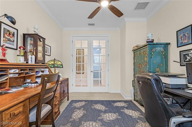 office area featuring crown molding, french doors, ceiling fan, and light wood-type flooring