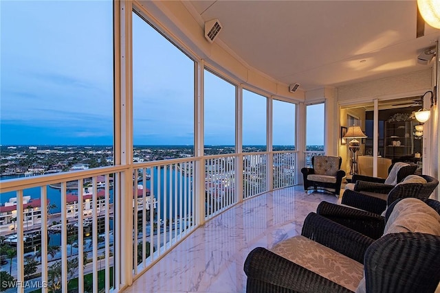 sunroom with a water view