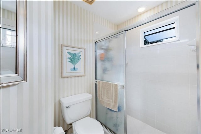1060 Partridge Cir Unit 201, Naples, FL 34104 - bathroom featuring toilet and a shower with door