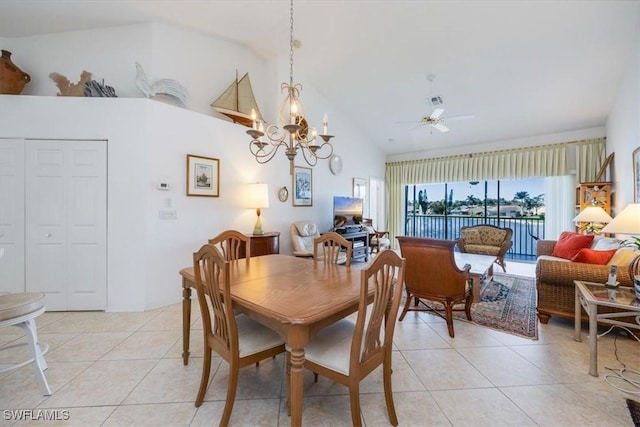 1060 Partridge Cir Unit 201, Naples, FL 34104 - tiled dining room featuring vaulted ceiling and ceiling fan with notable chandelier
