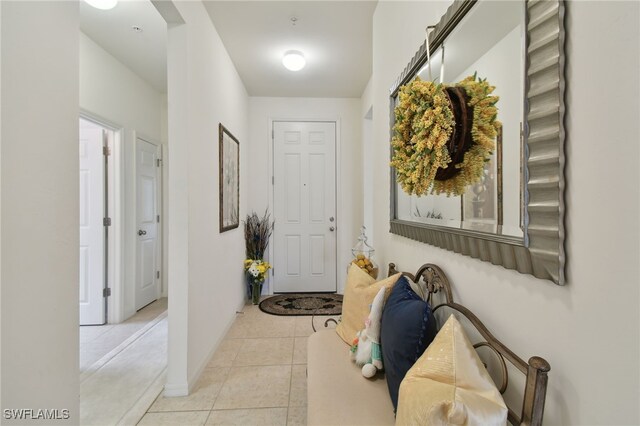 interior space with light tile patterned flooring