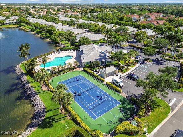 15011 Sandpiper Preserve Blvd Unit 106, Fort Myers, FL 33919 - drone / aerial view of a pool and a nearby body of water