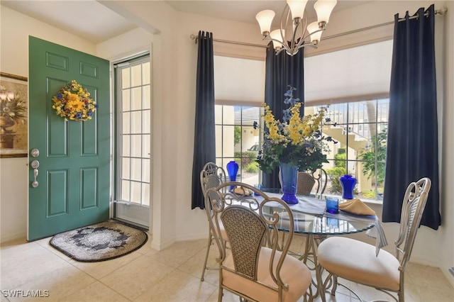 interior space featuring light tile patterned floors and a notable chandelier