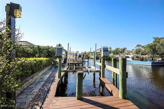 dock area featuring a water view