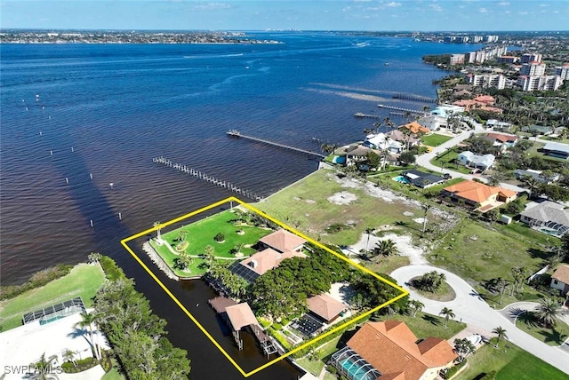 birds eye view of property featuring a water view