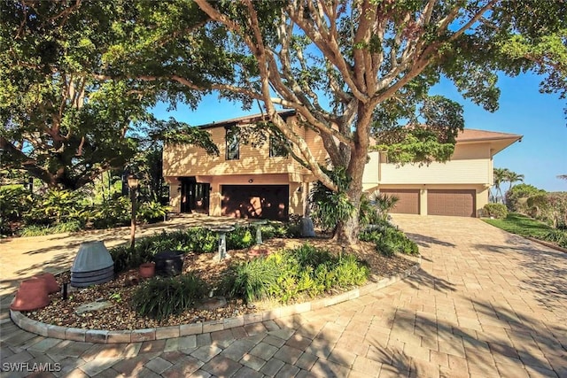 view of front of home with a garage