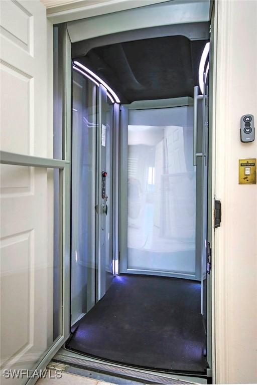 doorway to property with elevator