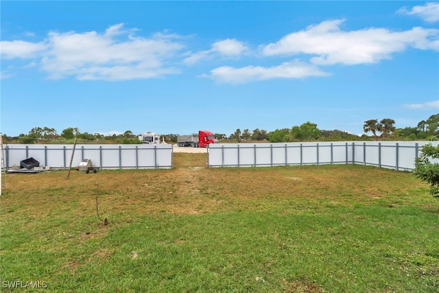 view of yard with fence