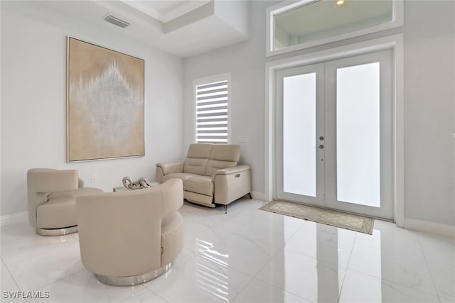 interior space featuring marble finish floor, french doors, visible vents, and baseboards