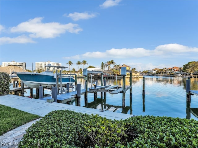 dock area featuring a water view and boat lift