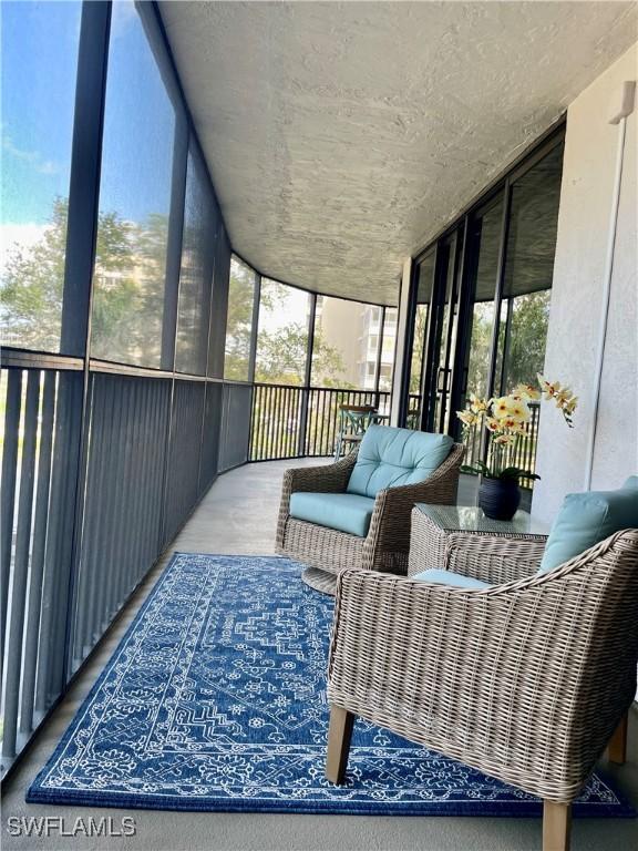 sunroom / solarium featuring a healthy amount of sunlight