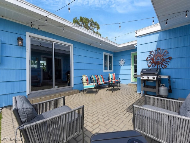 view of patio / terrace with grilling area and an outdoor hangout area